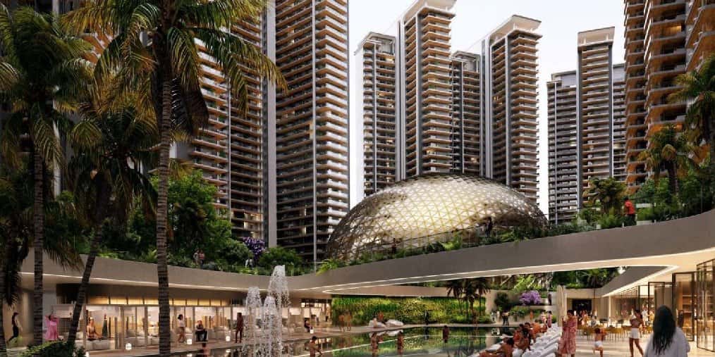 Elan The Presidential Penthouses — towers above a retail plaza with a glass dome