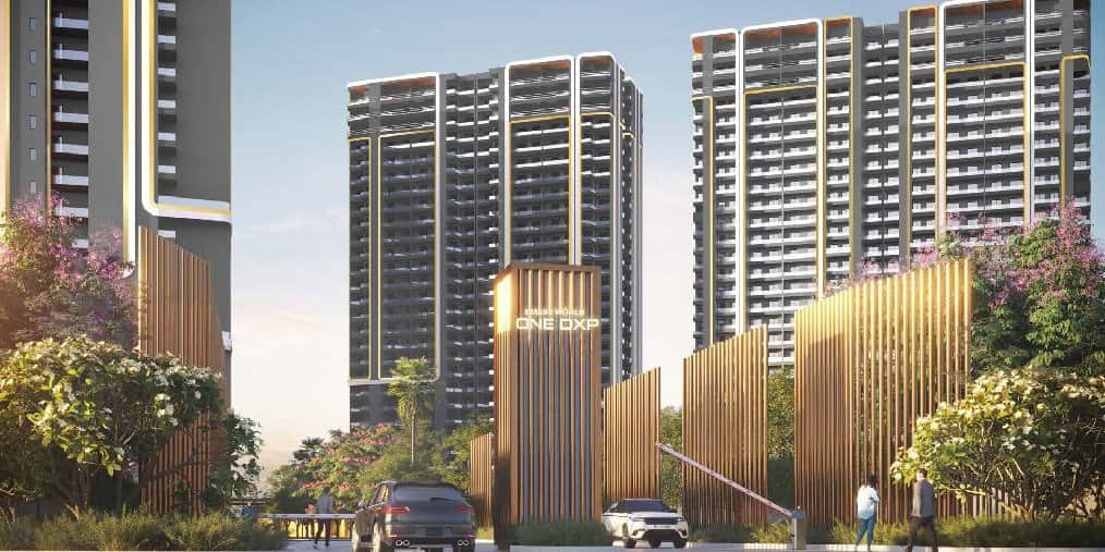 Smartworld One DXP — towers behind a sculpted gold entrance