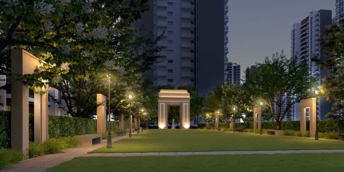 Sobha City — landscaped garden and pavilion at dusk