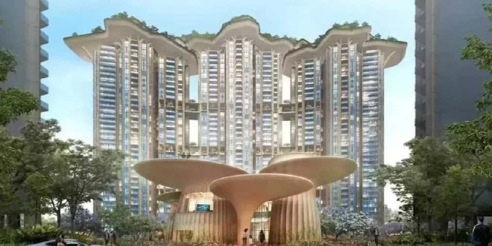 Tulip Monsella — towers behind a canopy-roofed entrance pavilion