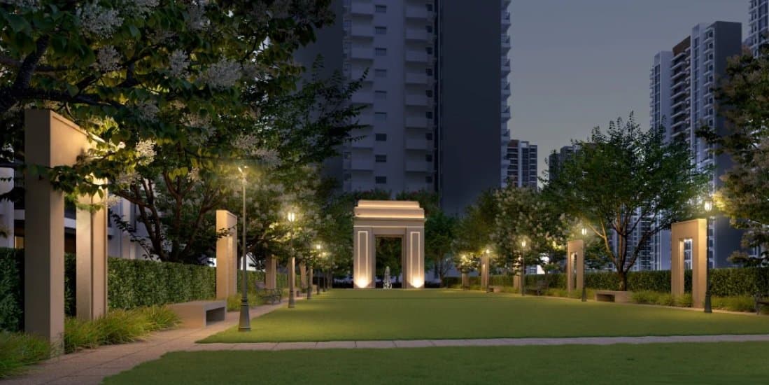 Sobha City — landscaped garden and pavilion at dusk