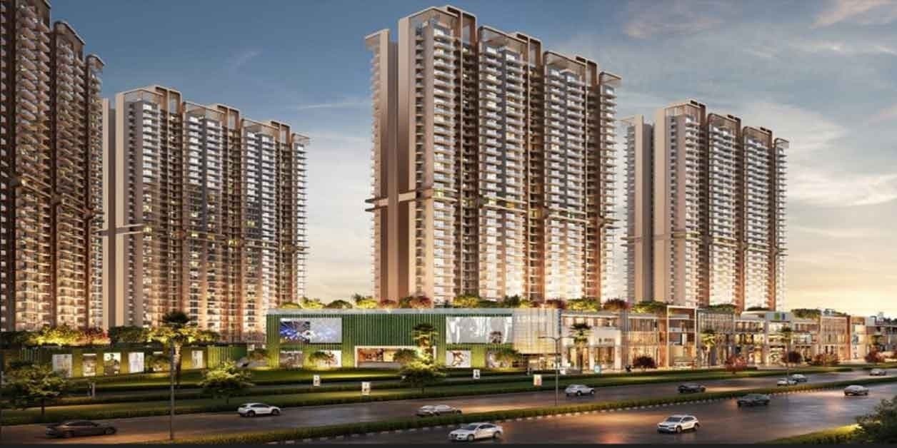 Godrej Vrikshya — towers and street-front retail at dusk